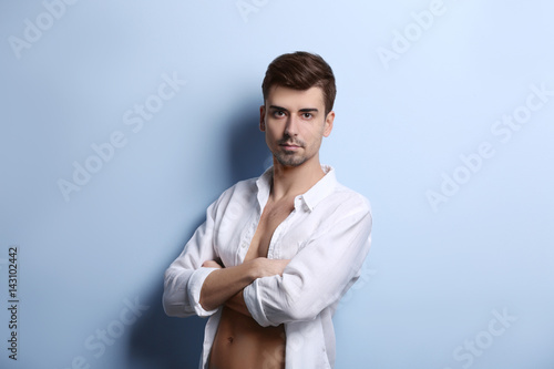 Handsome young man posing o...