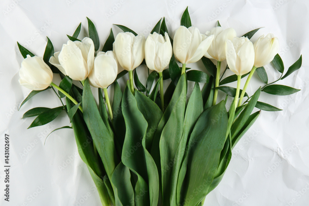 Beautiful bouquet of white tulips on light background Beautiful bouquet of white tulips on light background