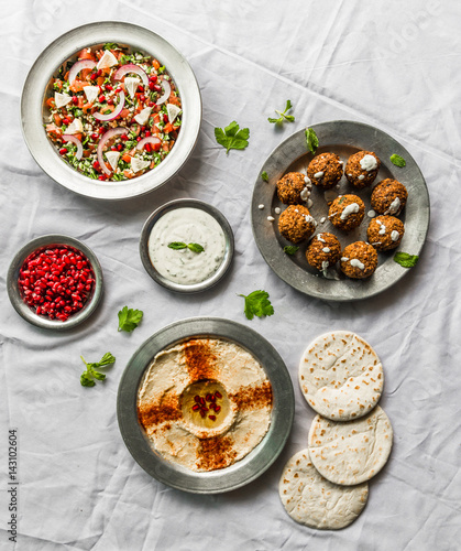 Selection of traditional Arab and Jewish food, selective focus. Healthy food, fitness, and sport diet concept.
