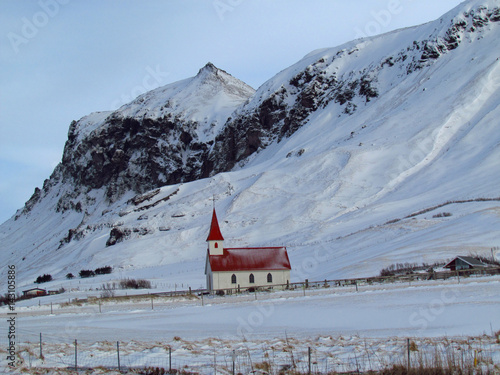 Church in the mountains of Iceland photo