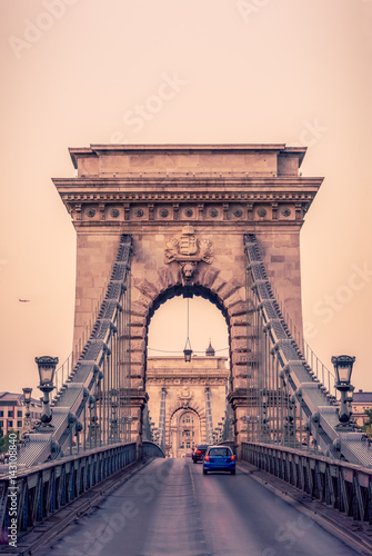 Photography Cars Drive Over the Historic Chain Bridge in Budapest