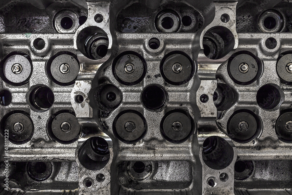 closeup car engine with soft-focus in the background. over light