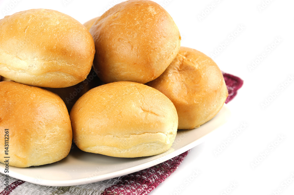 close up on fresh baked dinner roll close up on fresh baked dinner roll