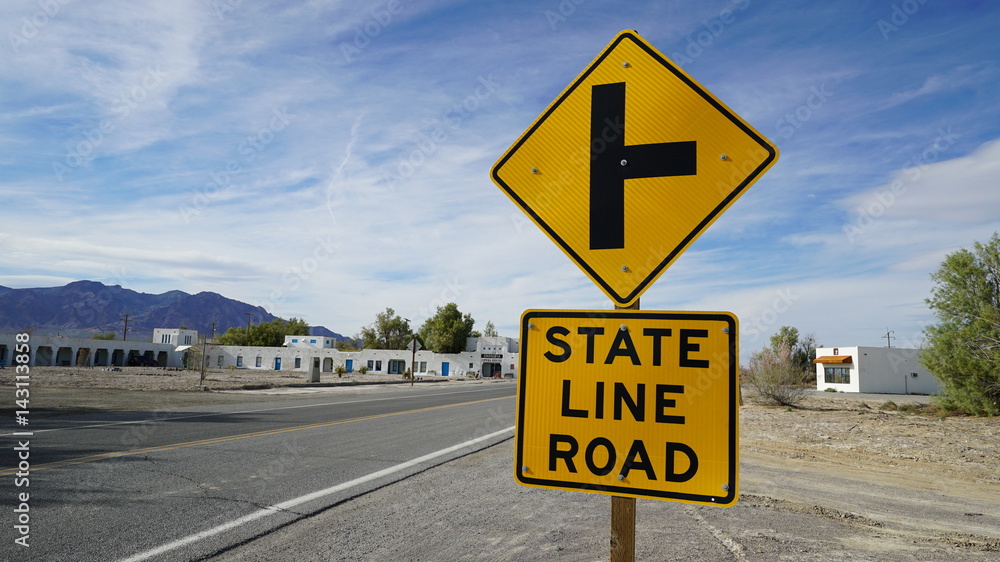 road sign by California/Nevada boarder in Death Valley Junction.