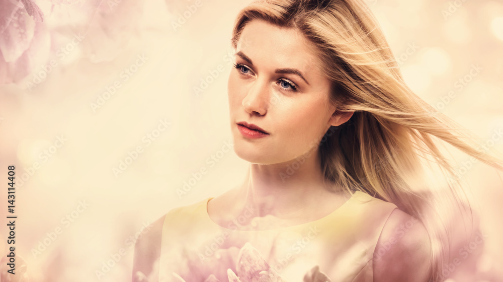 Beautiful young woman on pink floral background