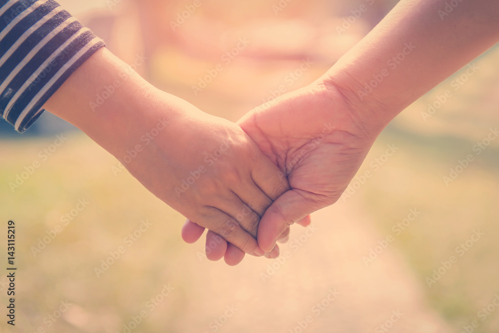 Happy couple holding hands together as forever love in Valentine day Happy couple holding hands together as forever love in Valentine day