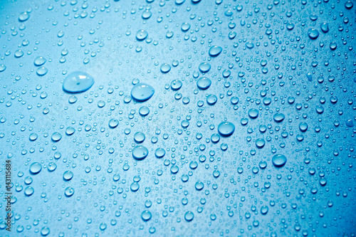 Water drops on blue background.