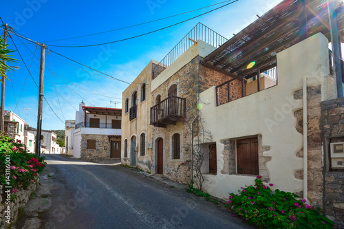 A nice traditional neighborhood with old stone houses at Milatos, Crete, Greece.