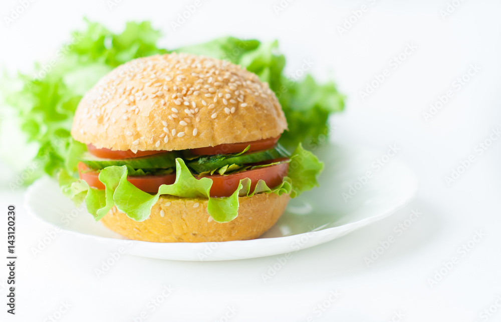 Sandwich, hamburger with vegetables on a white background, fast food. Banner for cafe Sandwich, hamburger with vegetables on a white background, fast food. Banner for cafe