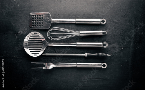 Kitchen tools. On Wooden background. Top view.