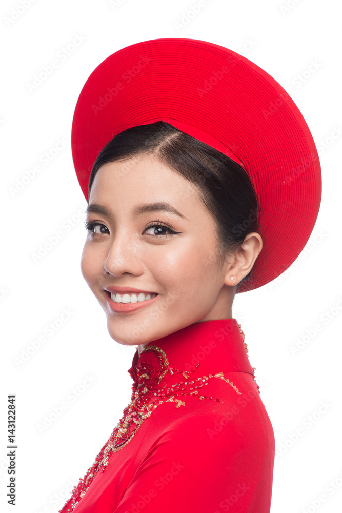 Charming Vietnamese Bride in Red Ao Dai Traditional Dress with hat. Charming Vietnamese Bride in Red Ao Dai Traditional Dress with hat.