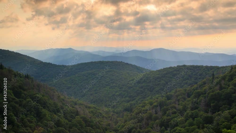 Sun rays shinning on the Blue Ridge Mountains of Asheville North Carolina Sun rays shinning on the Blue Ridge Mountains of Asheville North Carolina