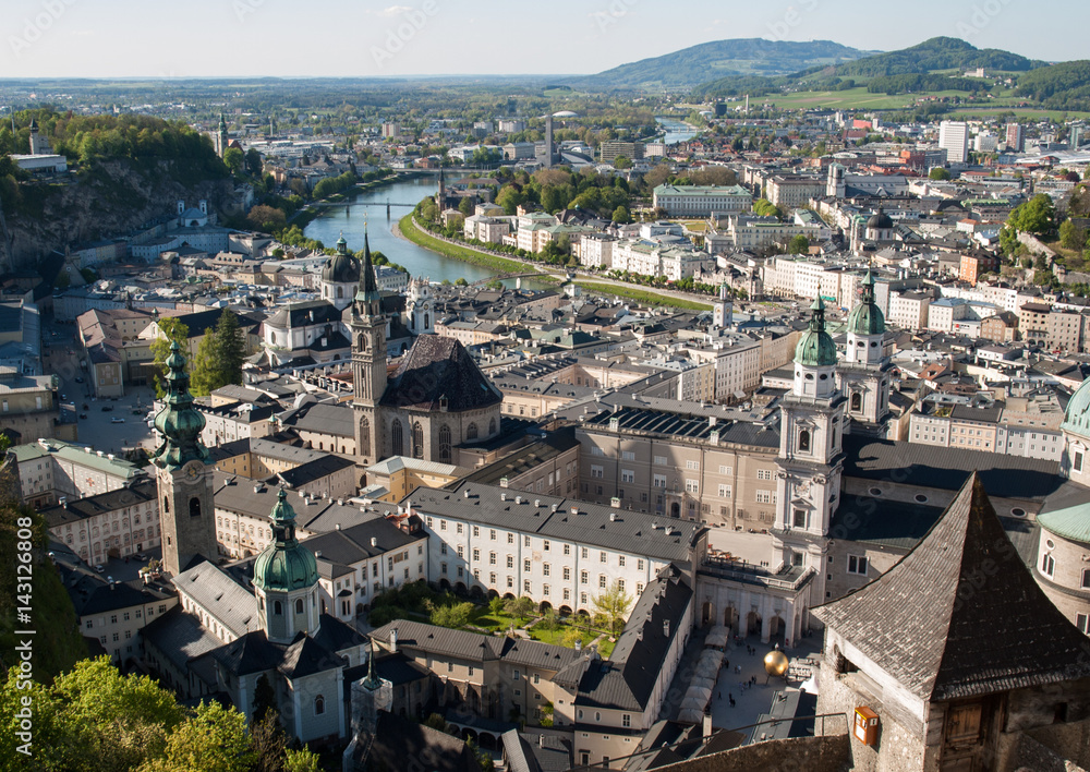 Fototapeta premium Top view of the Salzach river and the old city in center of Salzburg, Austria, from the walls of the fortress / Festung Hohensalzburg /