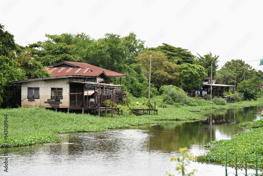 Fototapeta premium old house near coast river