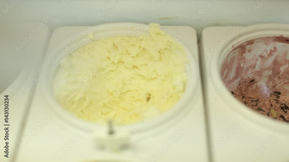 Slider shot of ice cream flavors in case. Slider shot of ice cream flavors in case.