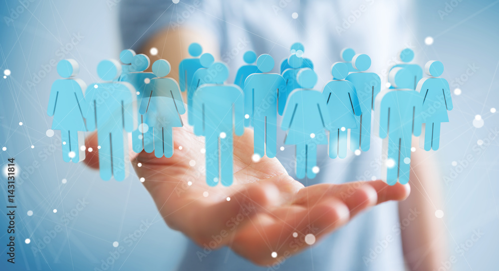 Businessman holding 3D rendering group of people in his hand Businessman holding 3D rendering group of people in his hand