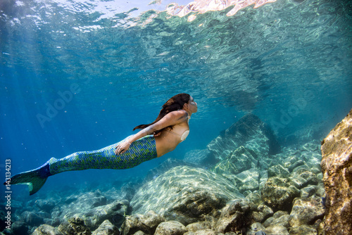 Mermaid swimming underwater...