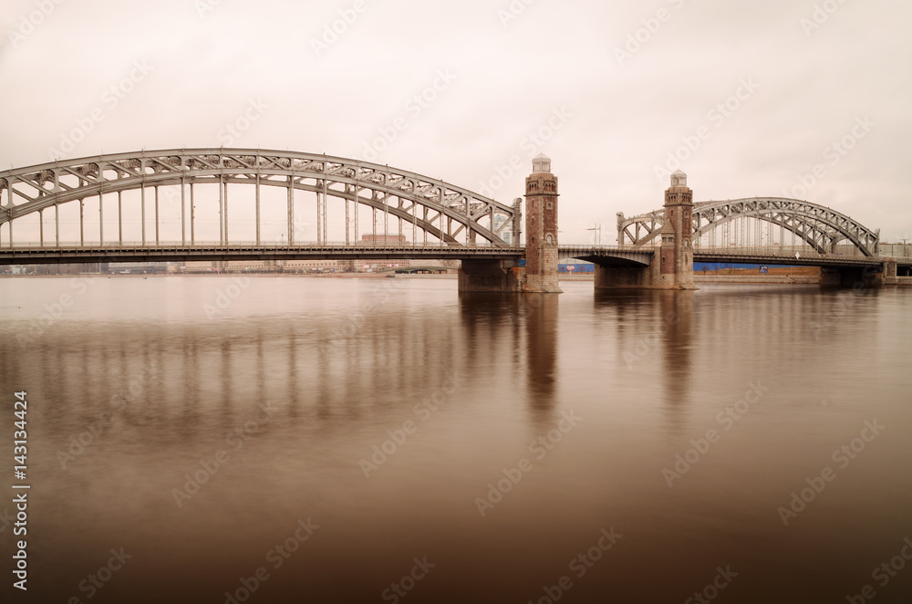 Obraz premium Water landscape with a bridge.