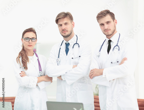 Portrait of a group of friendly doctors smiling.