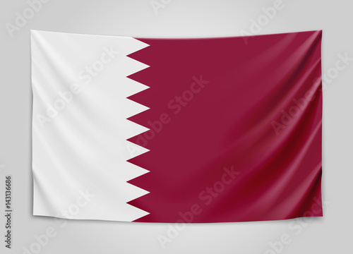 Hanging flag of Qatar. State of Qatar. National flag concept.