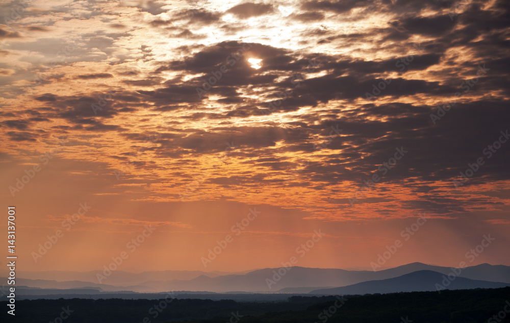 Beautiful red dawn with mountains. Photographed in the town of Berehove. Ukraine.