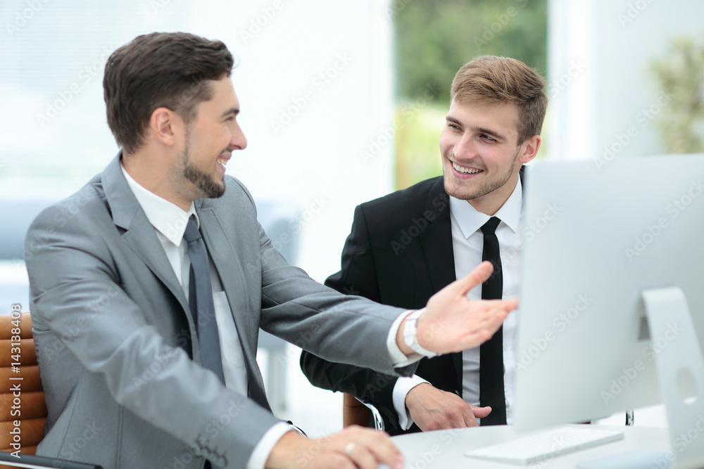 Business people at work. Two business people in formalwear discu Business people at work. Two business people in formalwear discu