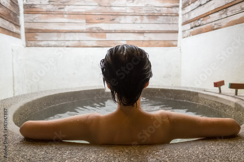 woman at hot spring pool