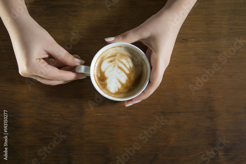 Lonely woman drinking coffee in the morning
