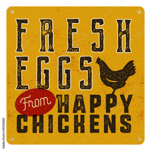 Farm fresh eggs poster on yellow vintage rusty metal background with chicken. Retro typography style