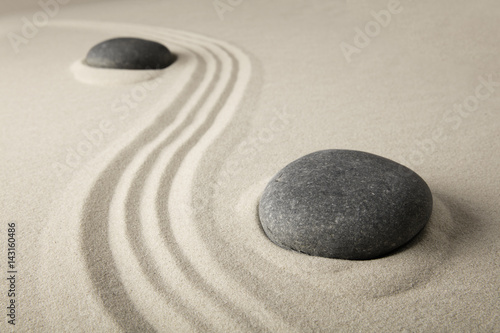 zen stone sand texture background. Spa wellness or yoga theme. Concept for relaxation, meditation harmony, spirituality and purity...