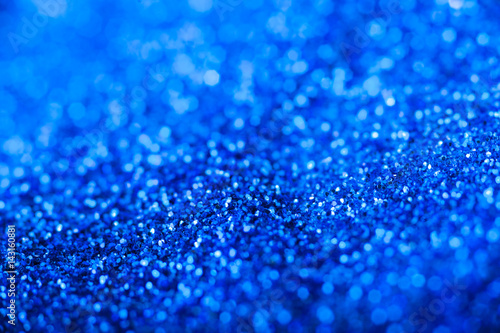 Blue bokeh abstract light glitter texture