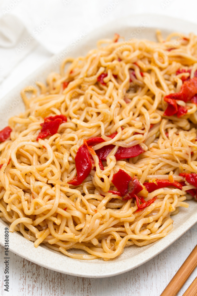 noodles with vegetables on white dish noodles with vegetables on white dish