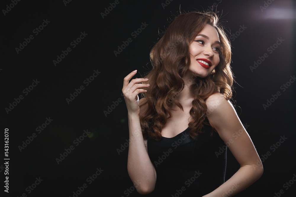 Cheerful gorgeous woman with red lips posing and looking away Cheerful gorgeous woman with red lips posing and looking away