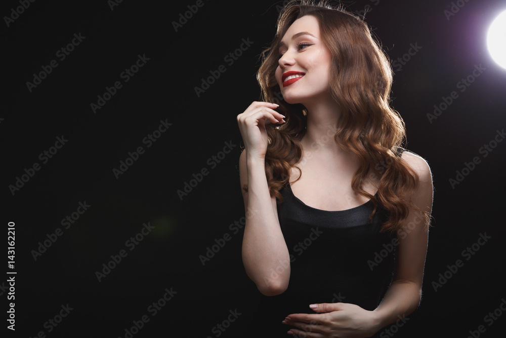 Cheerful gorgeous woman with red lips smiling and looking away Cheerful gorgeous woman with red lips smiling and looking away