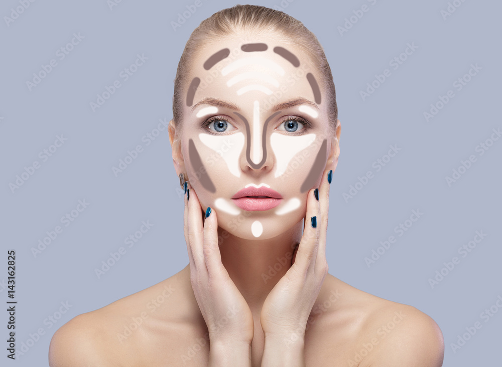Contouring. Make up woman face on grey background. Contour and highlight makeup. Contouring. Make up woman face on grey background. Contour and highlight makeup.