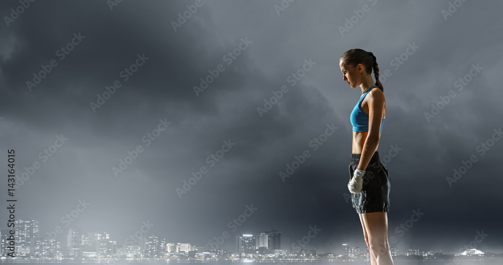 Young boxer woman outdoor . Mixed media . Mixed media