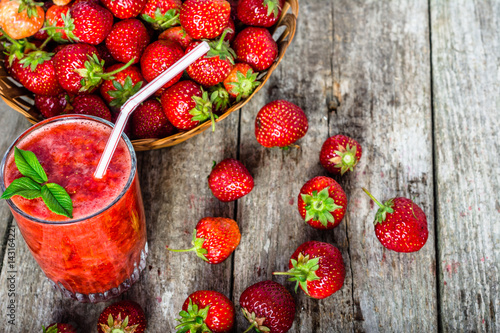 Fresh strawberry smoothie, summer drink, healthy antioxidant juice from fresh berry fruits photo