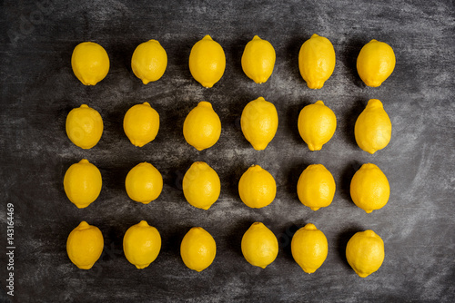 Fotografija Picture of lemons on grey background