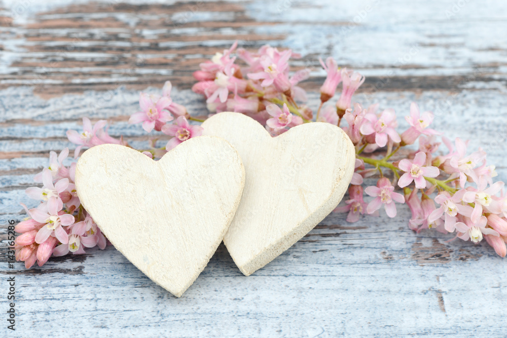 heart and flower lying on wood heart and flower lying on wood