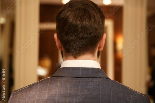 Back view of man in suit