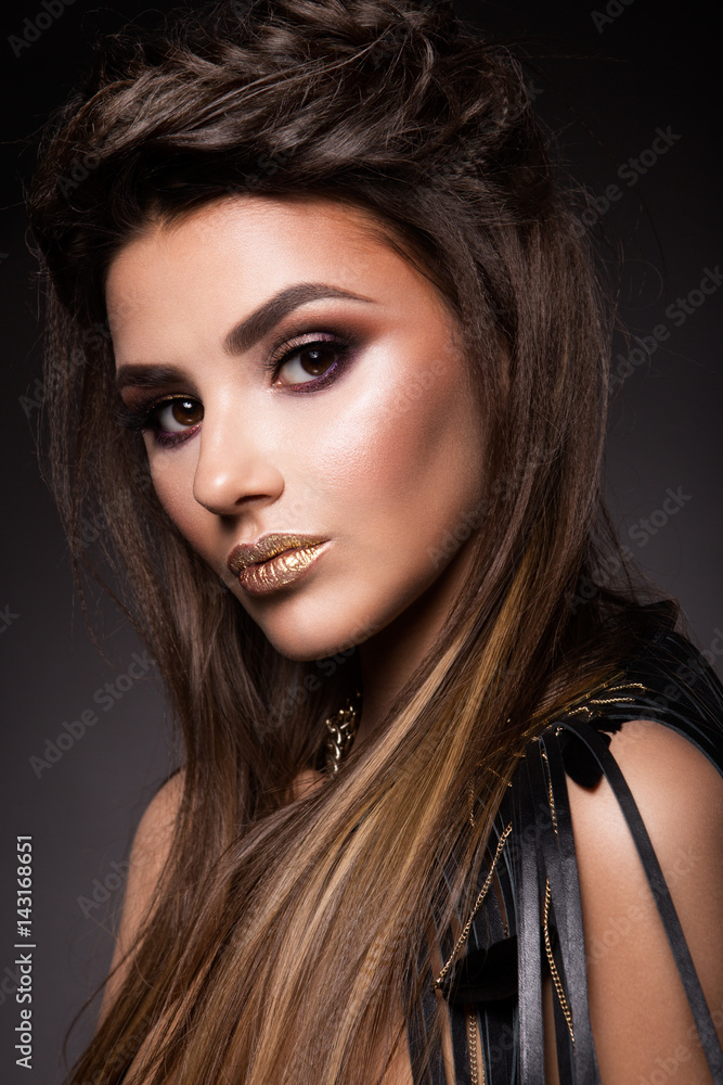 Fototapeta premium Beautiful woman with professional make up and hairstyle