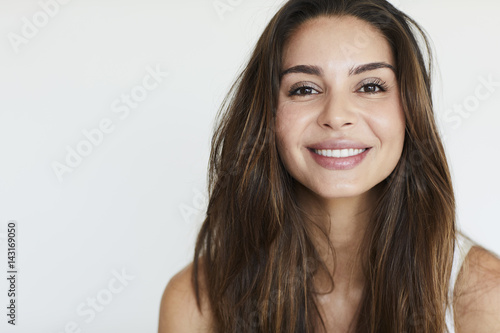 Beautiful brunette smiling at camera