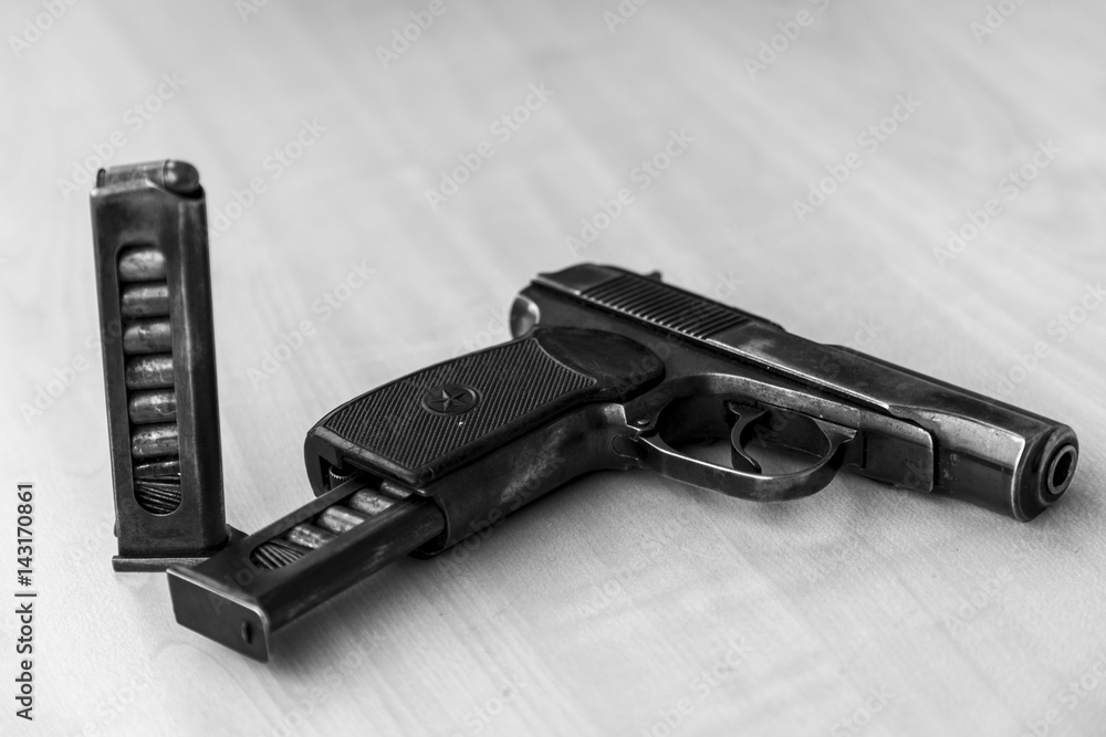 Military combat pistol in black and white Military combat pistol in black and white