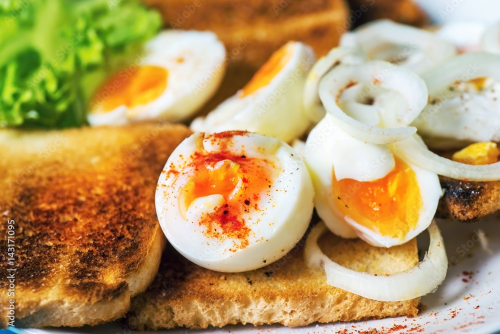 Boiled eggs on toast.