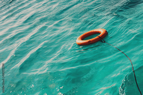 Life buoy in the sea with copy space