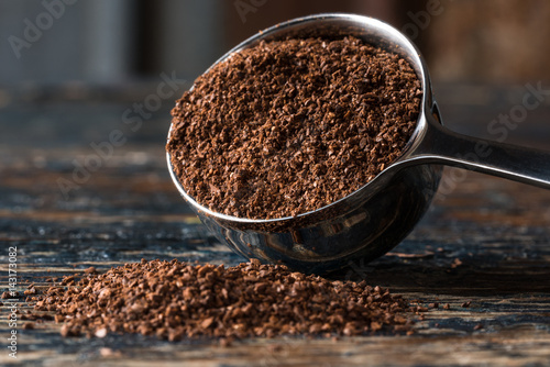 Ground Coffee Spilled from a Coffee Scoop