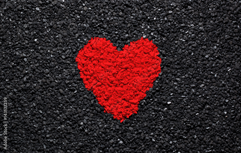Red heart on the black background, stones, gravel and shingle, love wallpaper, valentine Red heart on the black background, stones, gravel and shingle, love wallpaper, valentine