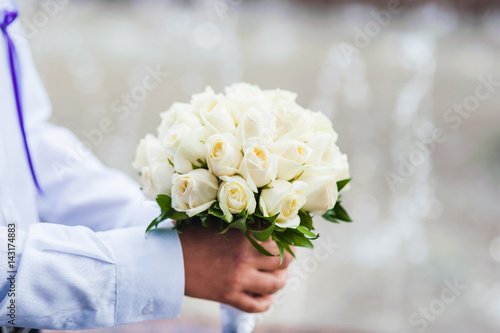 A beautiful bouquet of roses in hands