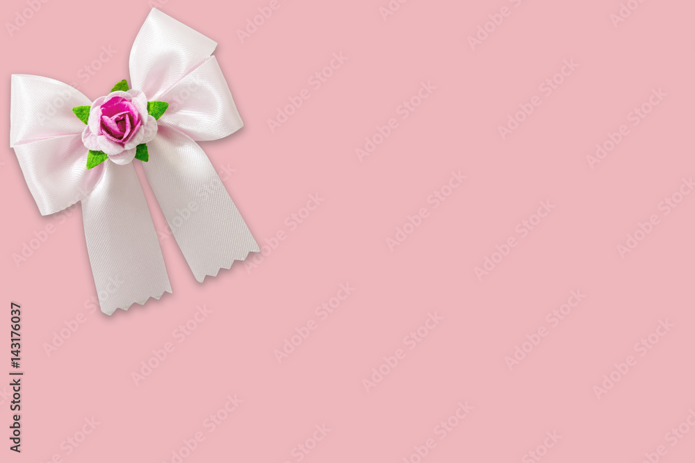 Pink ribbon on pink greeting cards background