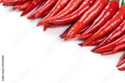 Red hot chilli peppers on white background